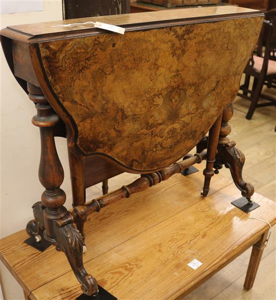 A Victorian walnut Sutherland table